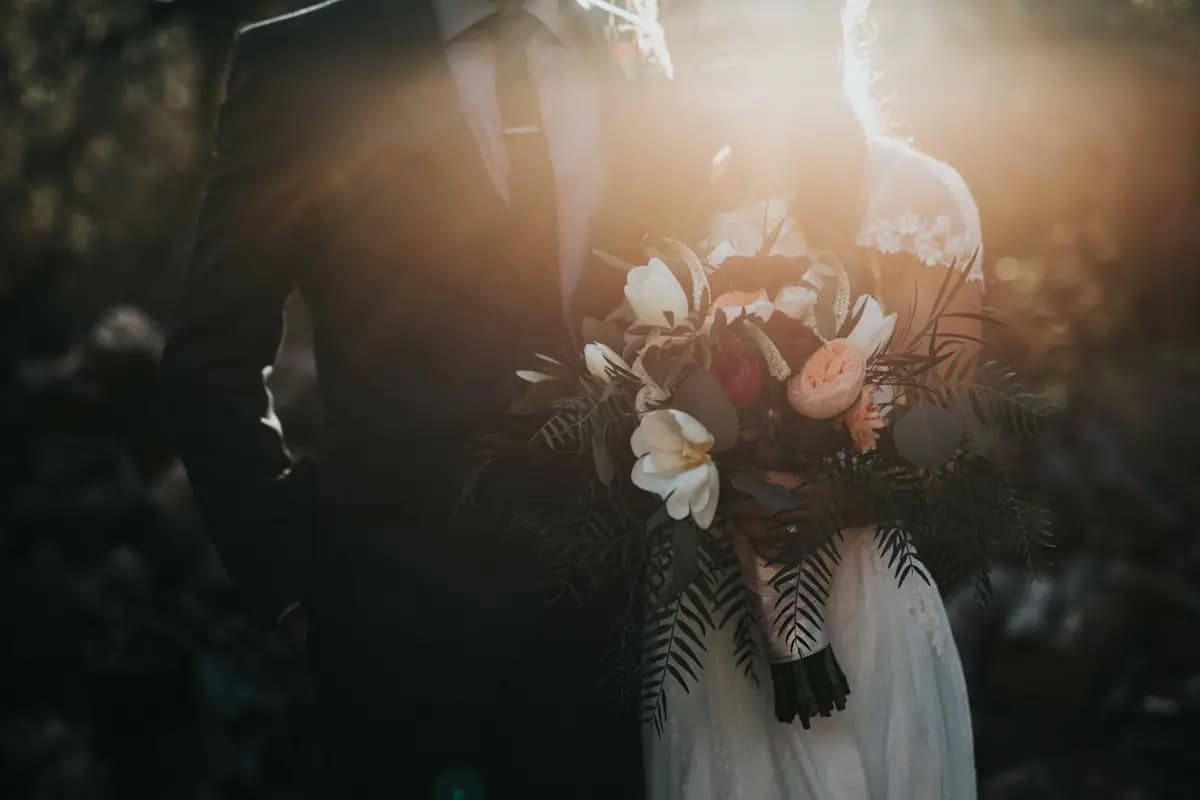 Bride holding a bouquet at a luxury wedding